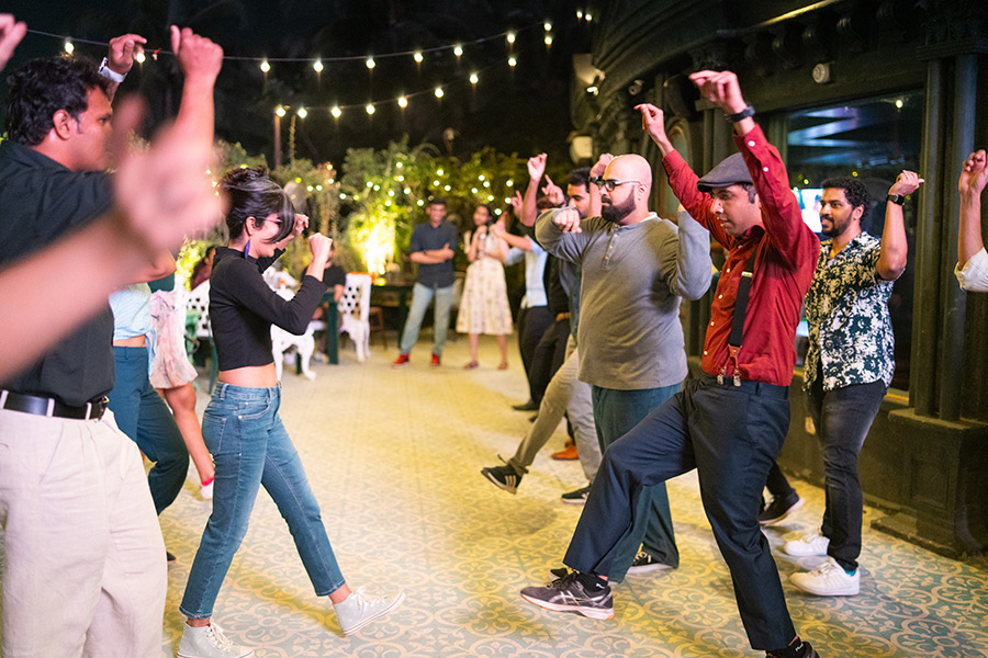 a group of dancers doing a line dance