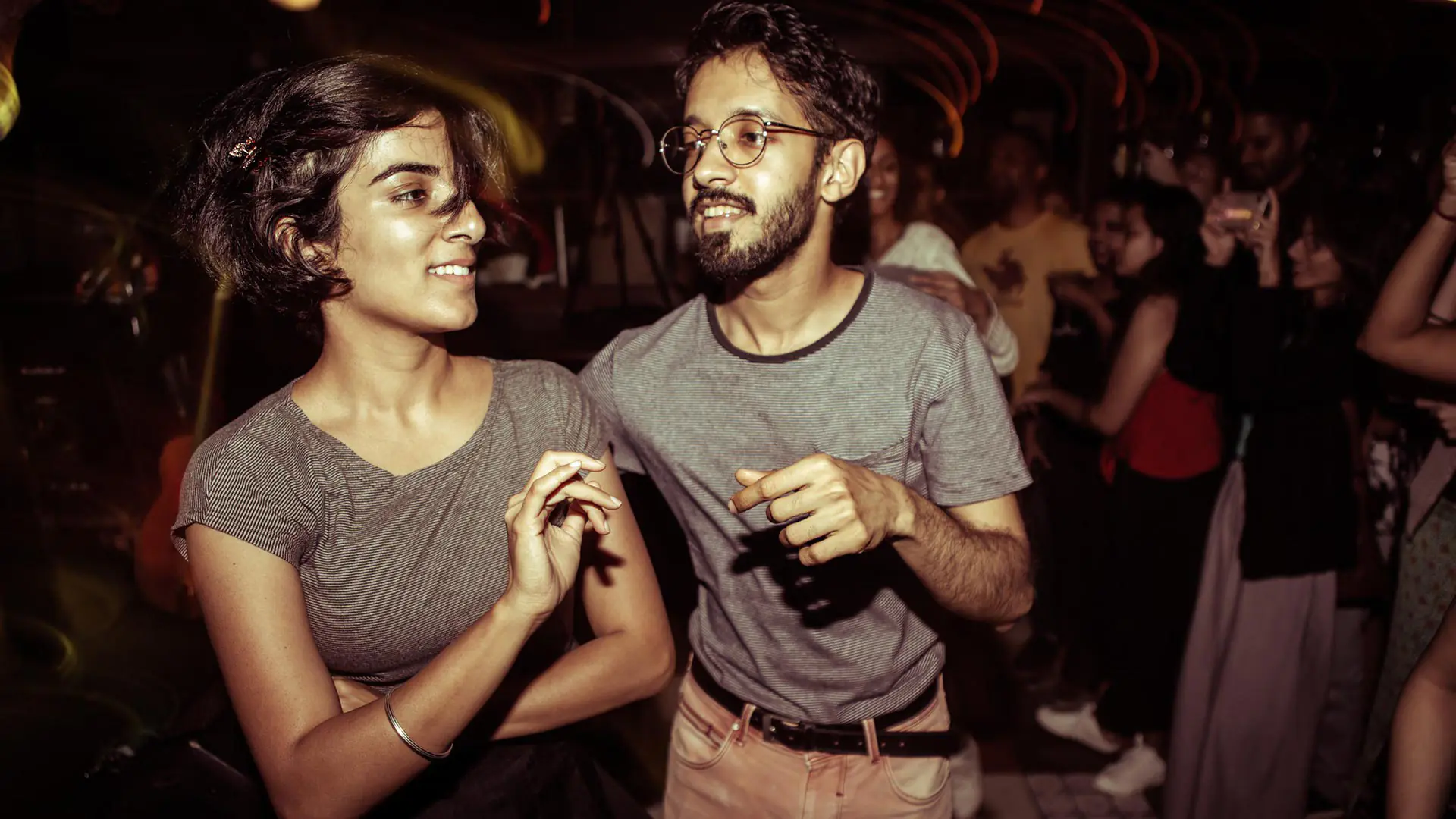 Prekshaa and Sam dancing Lindy Hop at a crowded Mumbai club